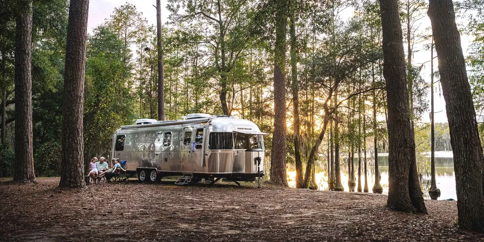Airstream owners gathered between trailers at a rally